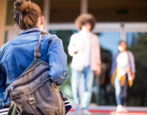 woman carrying backpack